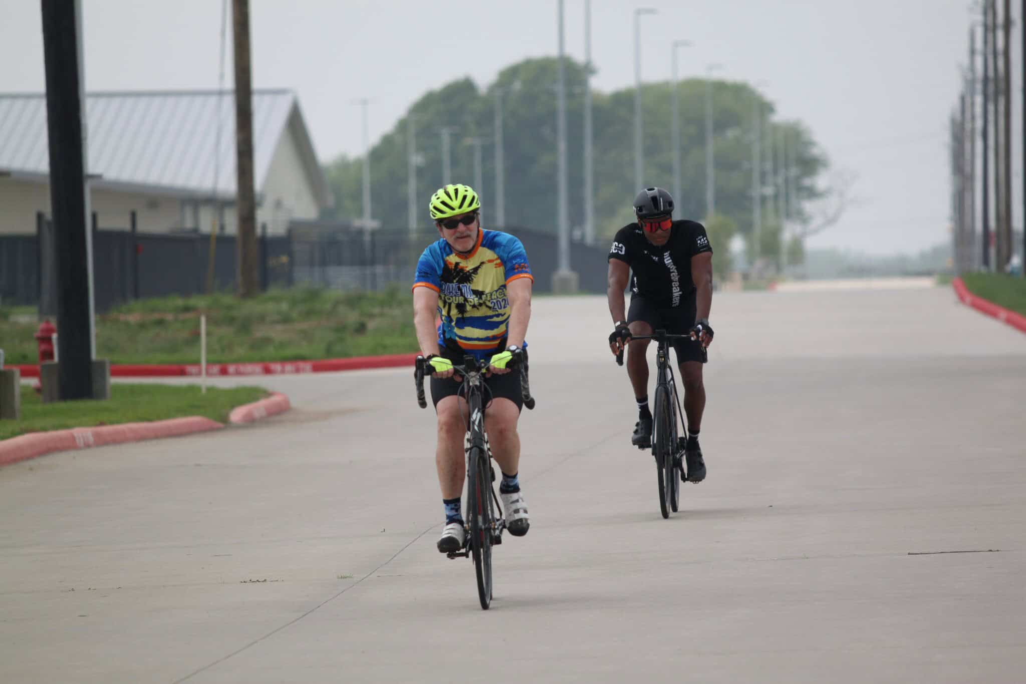 Bicycle riders enjoying a ride on a scenic route during Bluebonnet Express event.