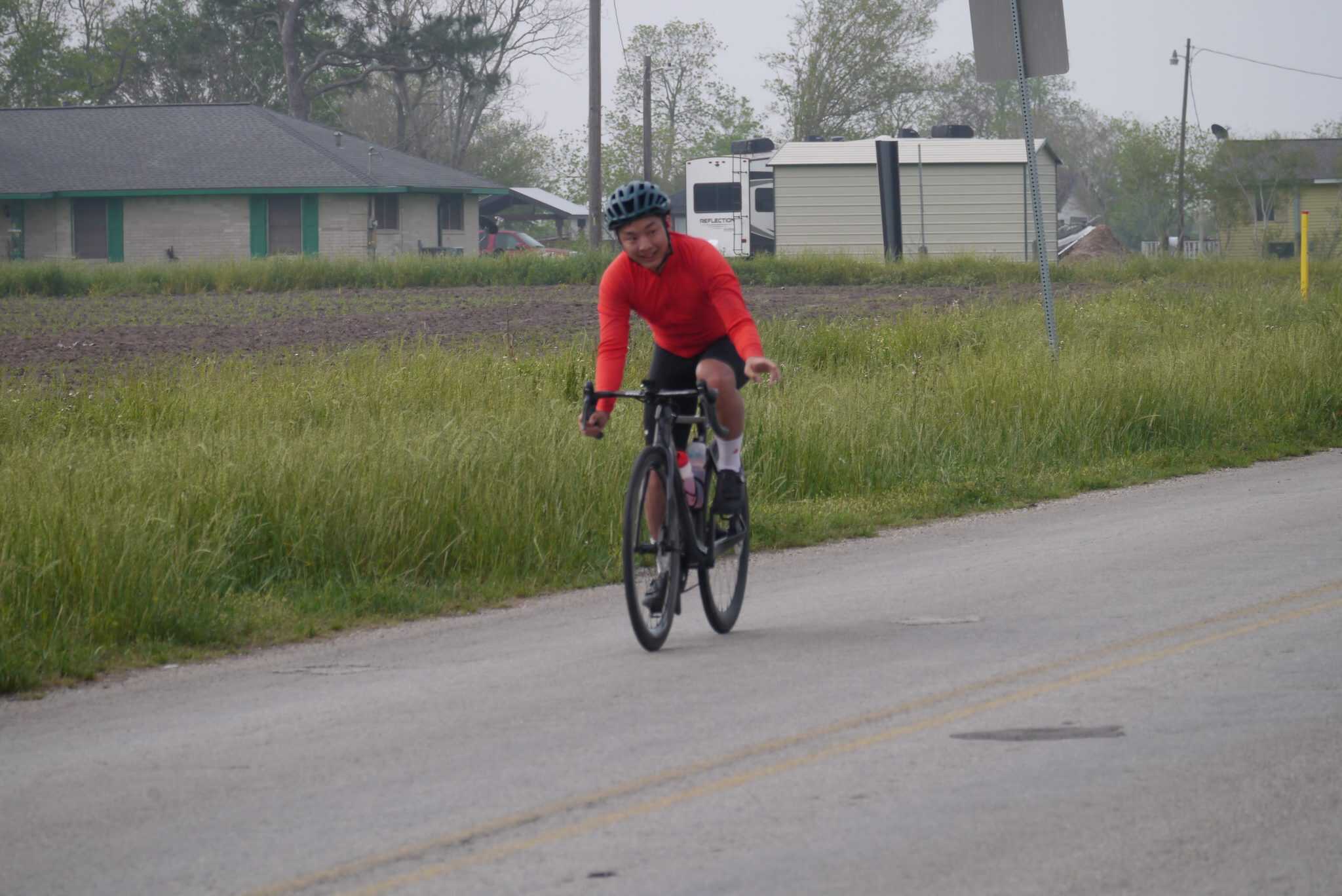 Bike ride along rural road for Bluebonnet Express; outdoor cycling adventure.