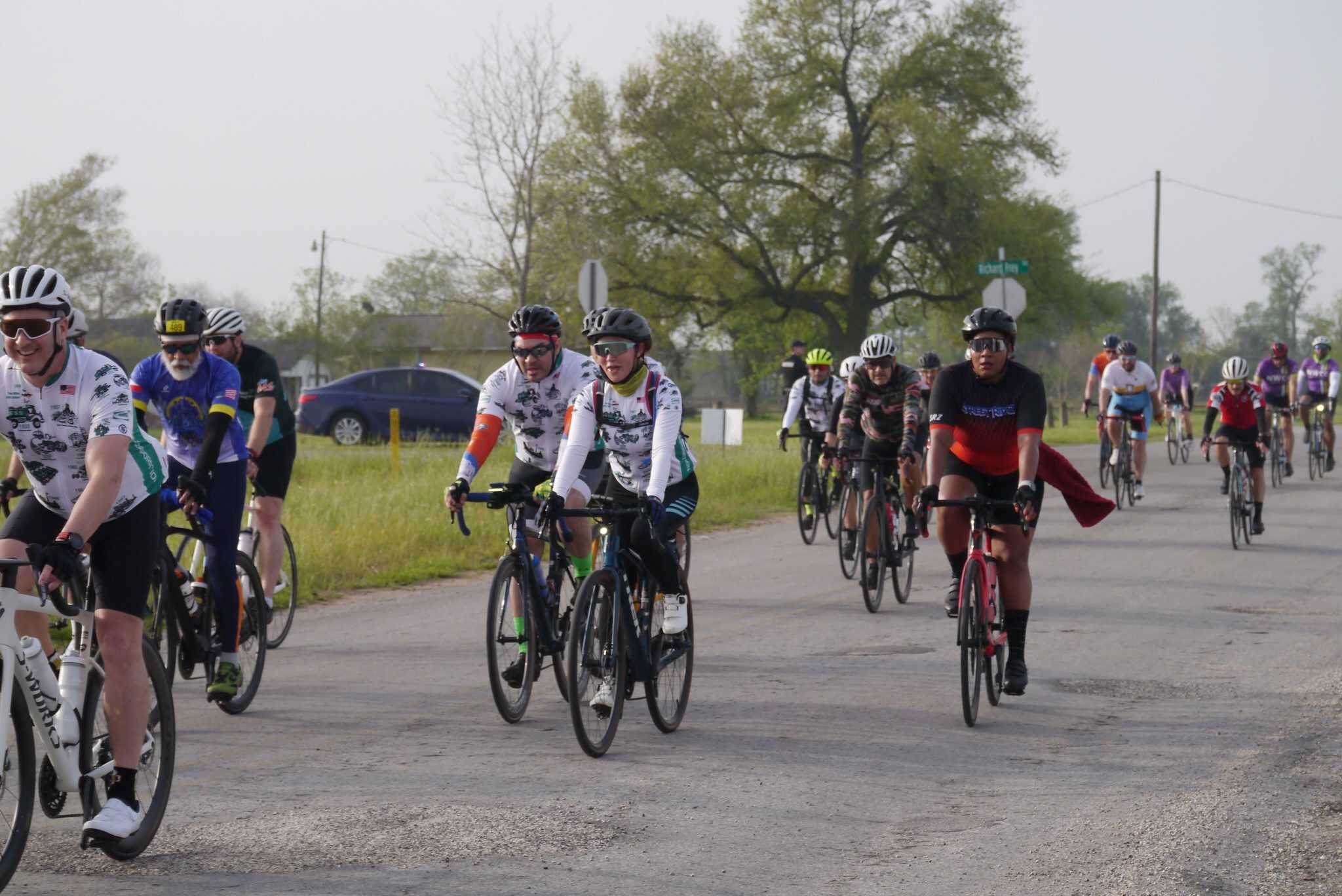 Vibrant group of cyclists enjoying the Bluebonnet Express bike ride event in Texas, promoting community and outdoor fitness.