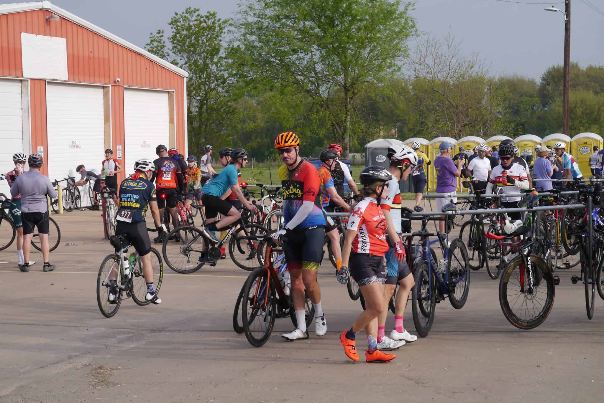 Bicycle race event at Bluebonnet Express, showcasing cyclists and biking enthusiasts.