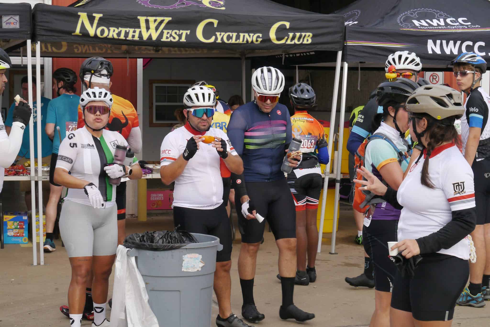 Cyclists at Bluebonnet Express cycling event, NorthWest Cycling Club, preparing for ride.