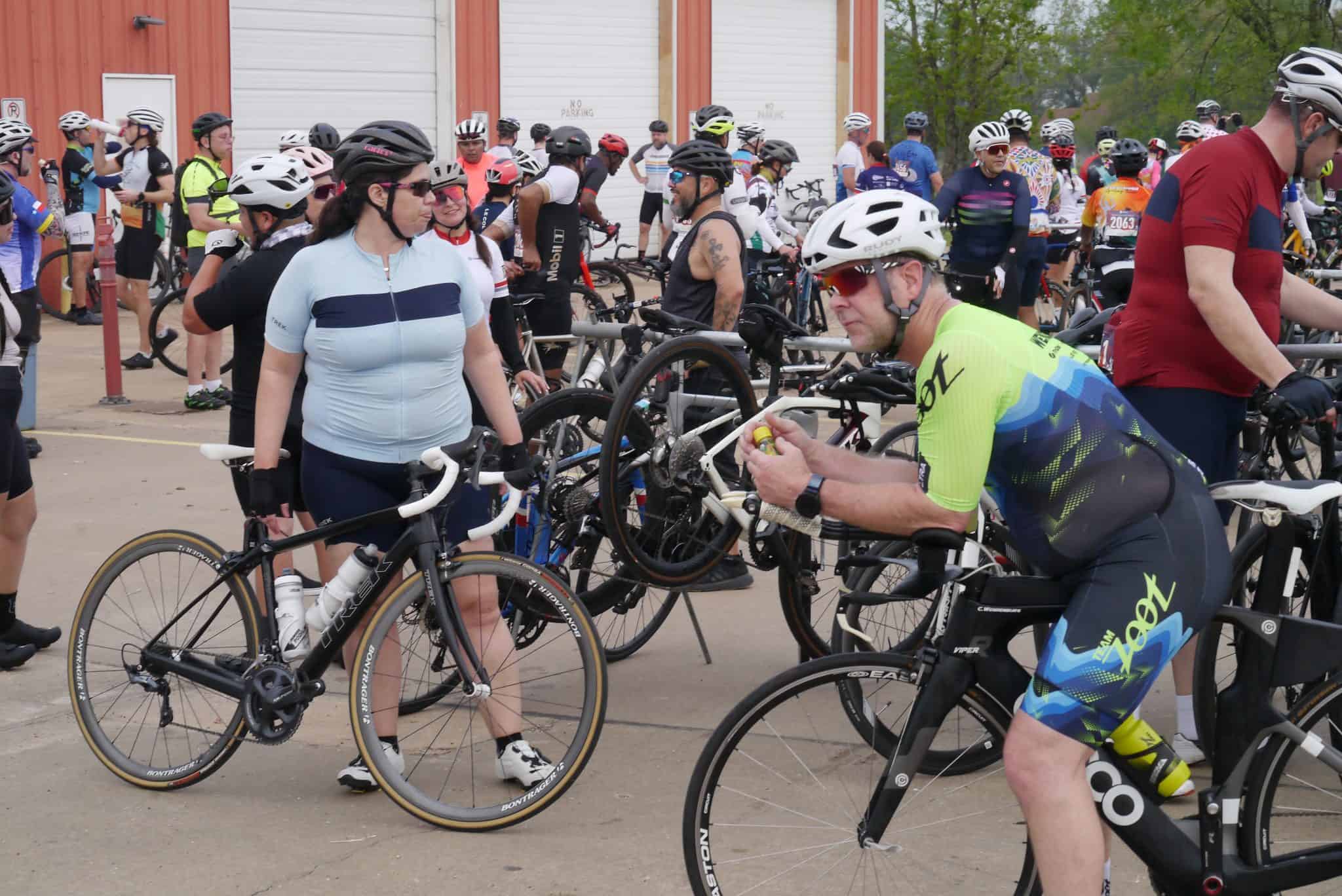 Cyclists preparing for Bluebonnet Express cycling event, group ride, or race in Texas.