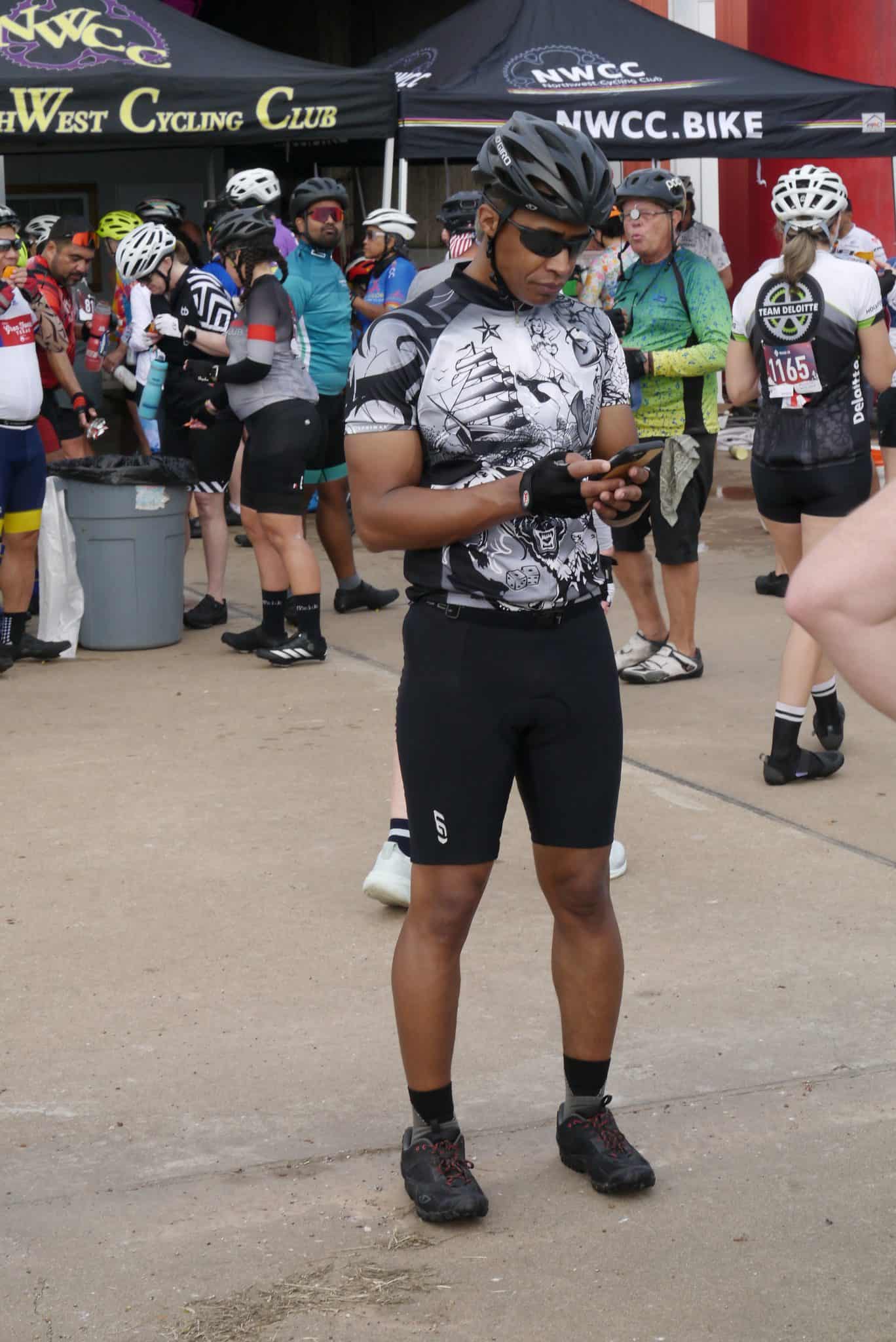 1. Cyclist wearing black helmet and shorts at Bluebonnet Express event.