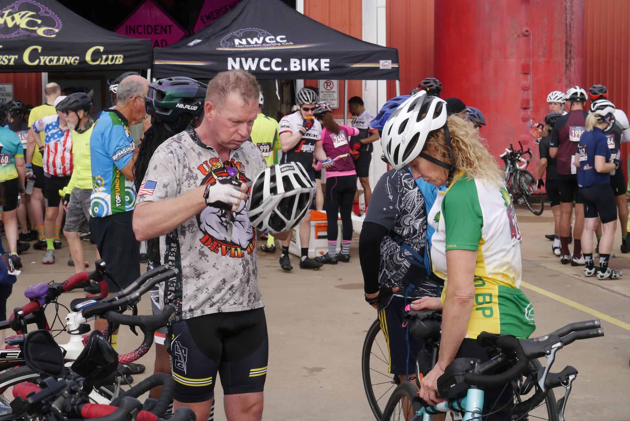 NWCC bike race event scene with cyclists preparing at Bluebonnet Express.