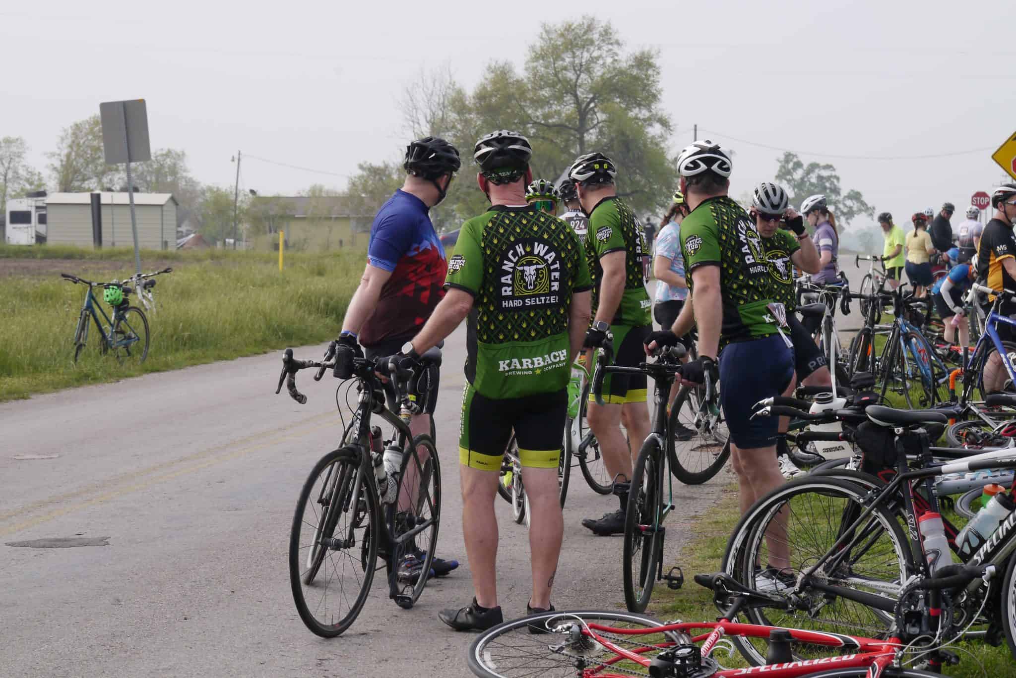 Cyclists gathering at Bluebonnet Express event for outdoor cycling activity.
