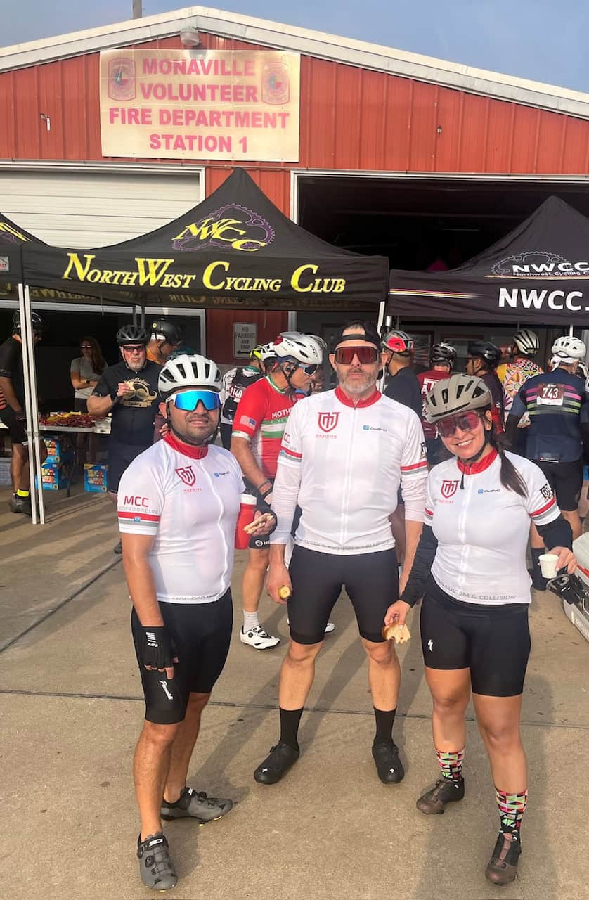 Cyclists from NorthWest Cycling Club at Bluebonnet Express event in front of Monaville Volunteer Fire Department.